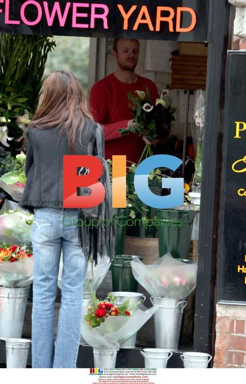 Gary Liniker and Danielle Bux shopping in London