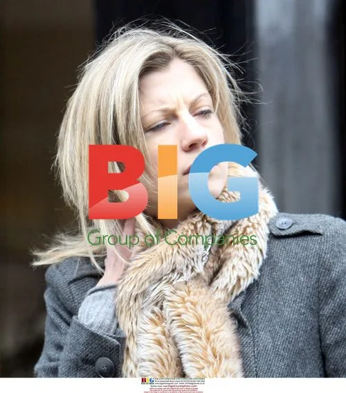 Claire Goose dresses for cold in London