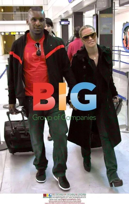 Anastacia and husband at Nice airport