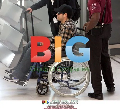 Jesse Metcalfe Arrives in Wheelchair