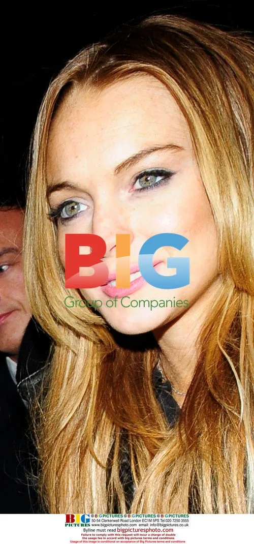 Linsday Lohan and Sam Ronson Leaving Cafe de Paris