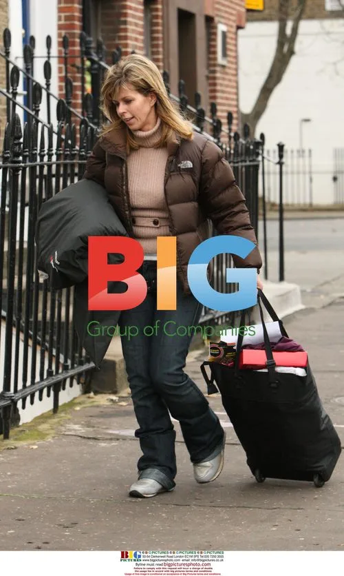 Kate Garraway arrives home bundled up
