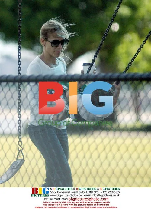 Sheryl Crowe and son at Perth playground
