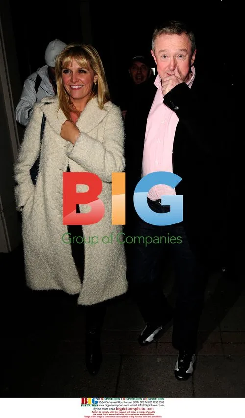 Louie Walsh and vocal coach leave restaurant
