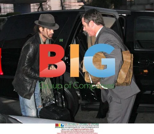 Colin Farrell Departs LAX