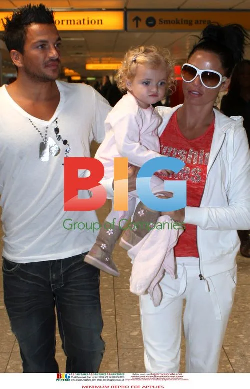 Katie Price and Peter Andre with daughter