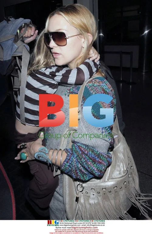 Kate Hudson Arriving at LAX with Son Ryder