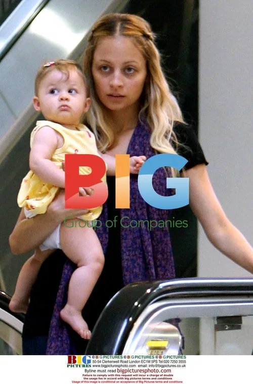 Nicole Richie and Joel Madden with baby Harlow