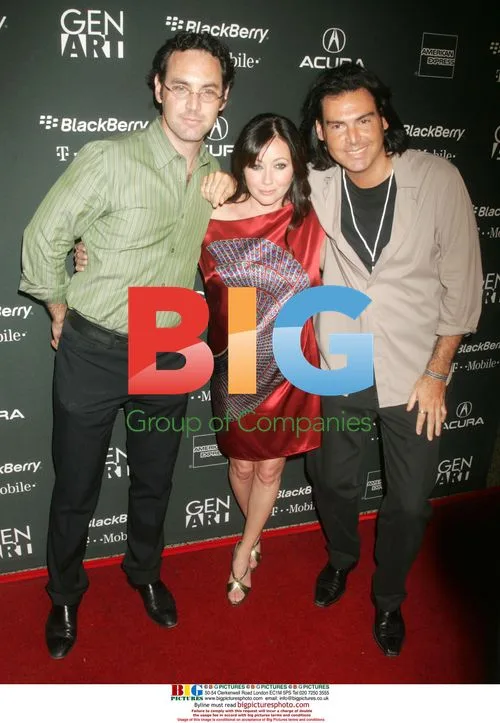 UK RIGHTS ONLY STEFAN GERARD, SHANNEN DOHERTY and IAN GERARD at Fashion Week