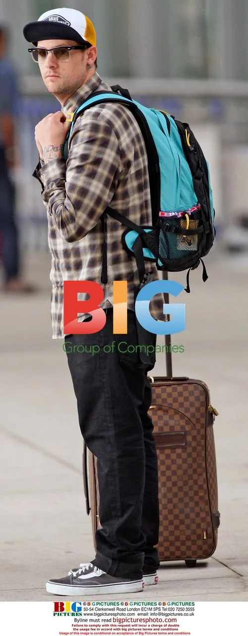 Joel Madden with backpack & luggage at LAX
