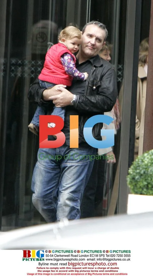 Mark Moraghan leaving hotel with family