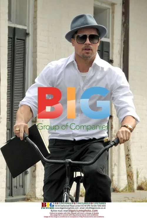 Brad Pitt cycles through New Orleans
