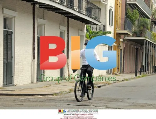 Brad Pitt cycles through New Orleans' French Quarter