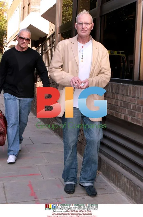Paul Gascoigne seen with friend after hospital visit