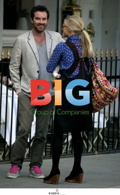 Laura Bailey and family stroll in London