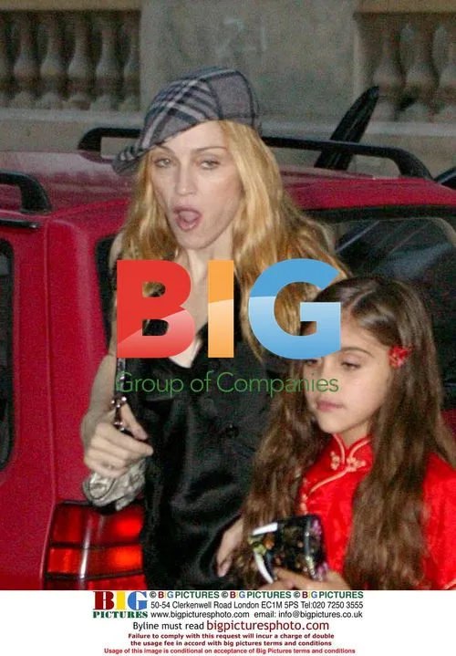 Madonna Takes Family to Kabbalah Service