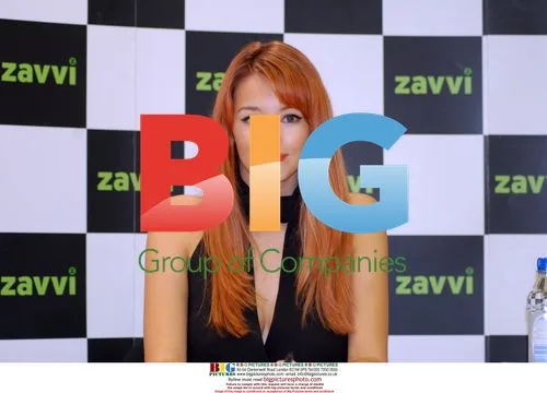 Keeley Hazel signs calendar at Zavvi