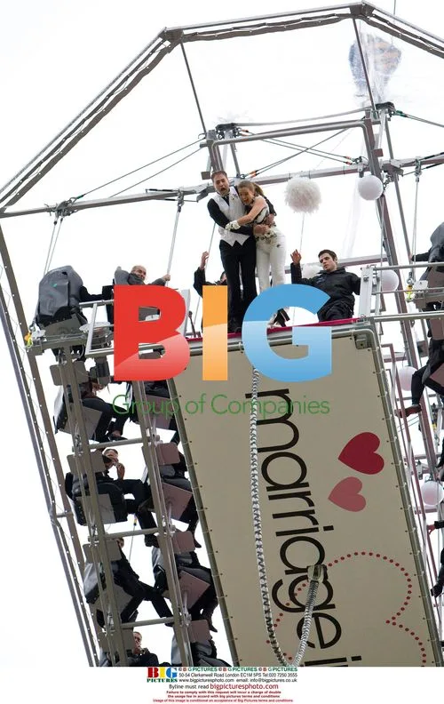Couple marries suspended 50m above ground