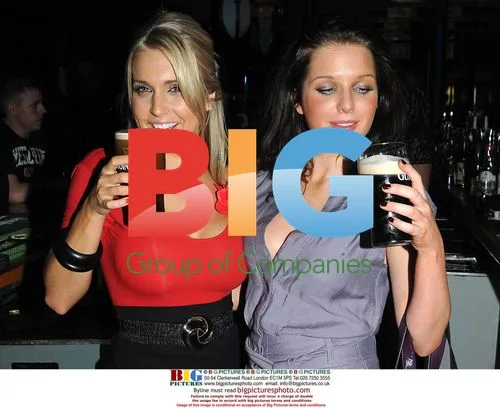 Celebrities pose as busty barmaids