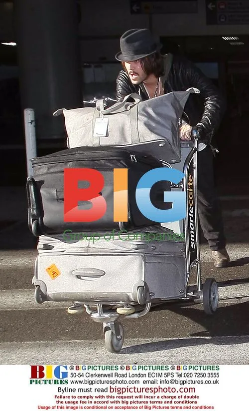 Cat Deeley and boyfriend Jack Houston at LAX