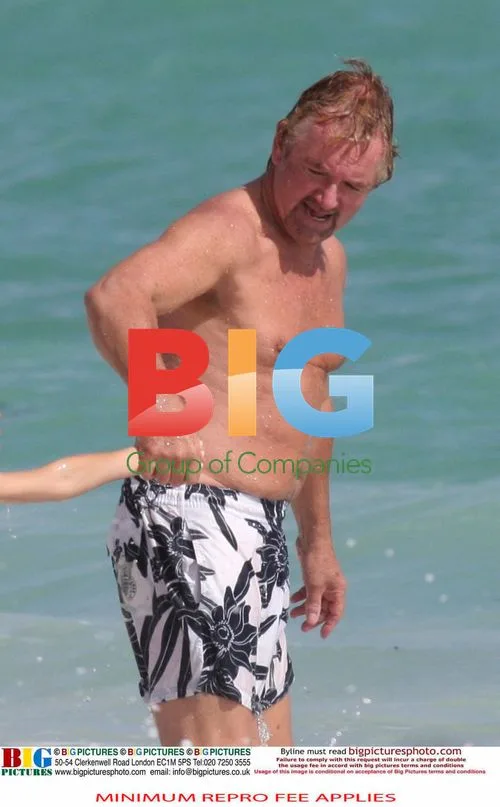Noel Edmonds and Liz Davis on beach