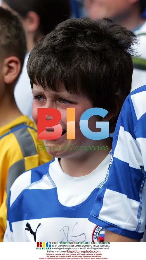 Sad Reading FC fan cries after loss