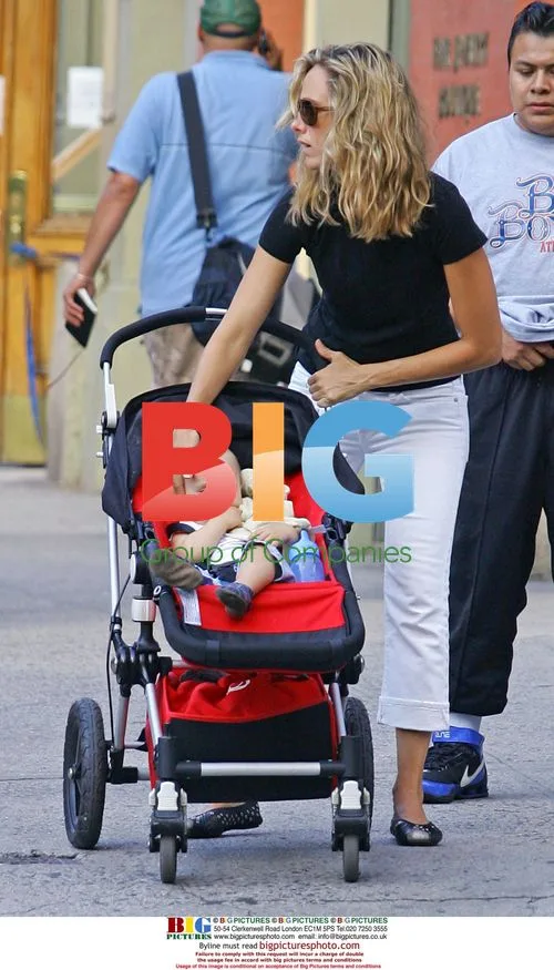 Kim Raver Strolls in NYC with Son