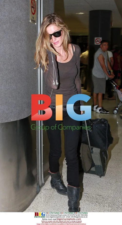 Gisele Bundchen lands at LAX in sheer top