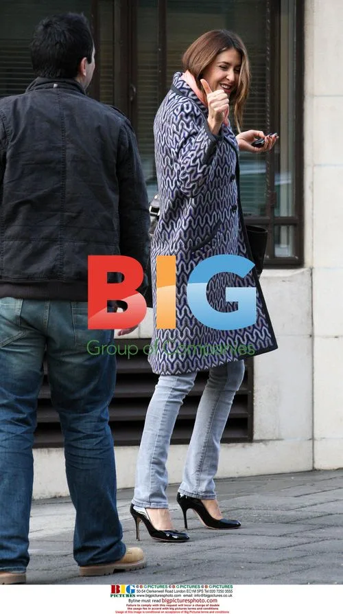 Lisa Snowden and friend leave Dorchester Hotel