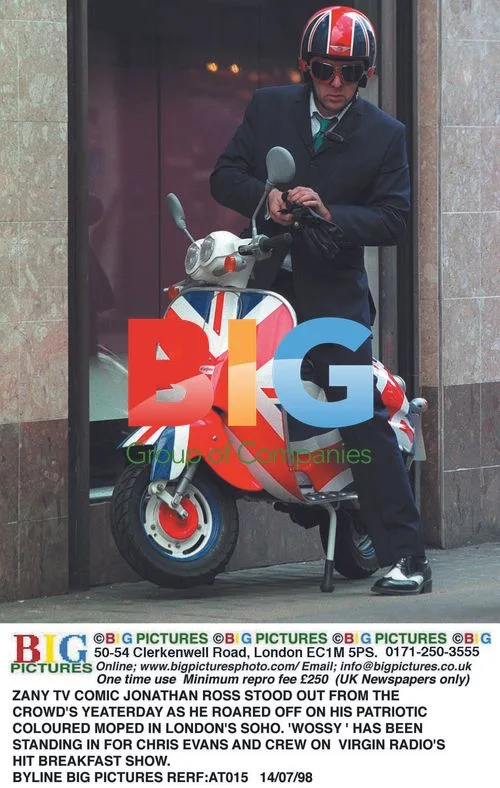Jonathon Ross rides moped in Soho