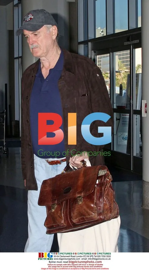 John Cleese and daughter at LAX