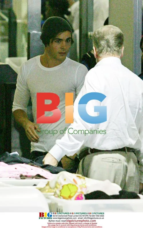 Zac Efron and Vanessa Hudgens at LAX
