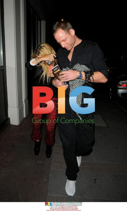 Meg Matthews seen with mystery man