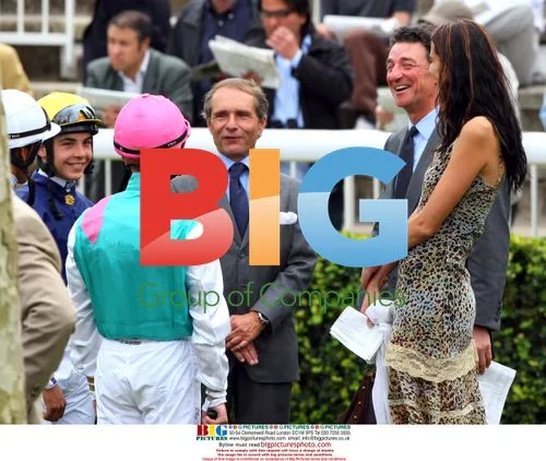 Baron de Rothschild and model Irene Salvador at Longchamp Racecourse
