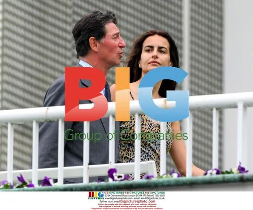Baron Rothschild and Model Irene Salvador at Longchamp Races