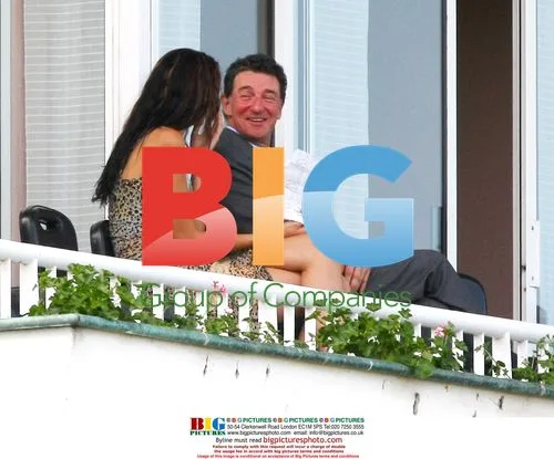 Baron de Rothschild and model enjoy Longchamp races