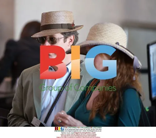 James Spader and pregnant girlfriend depart LAX