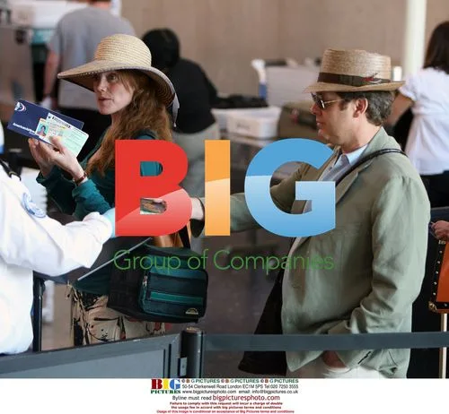 James Spader and pregnant girlfriend depart LAX