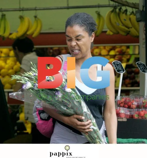 Sophie Okenedo buys flowers in London