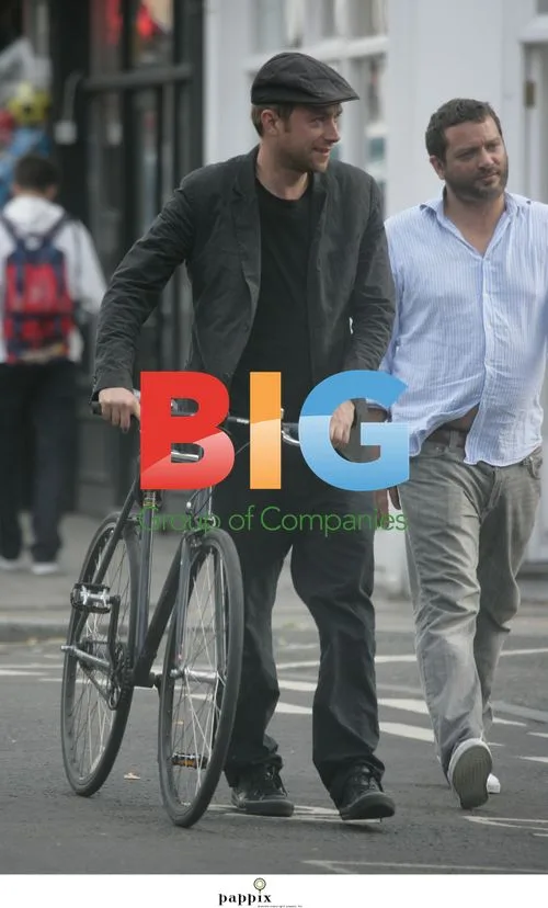 Damon Albarn Fixes Bike in London