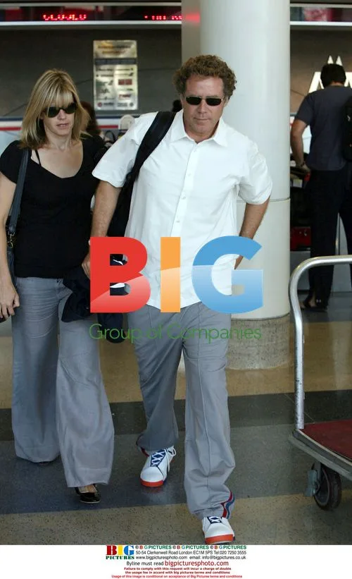 Will Ferrell and wife check in at LAX