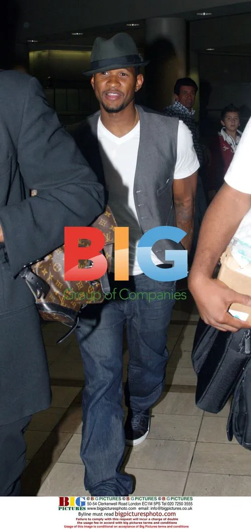 Usher at LAX after NFL performance