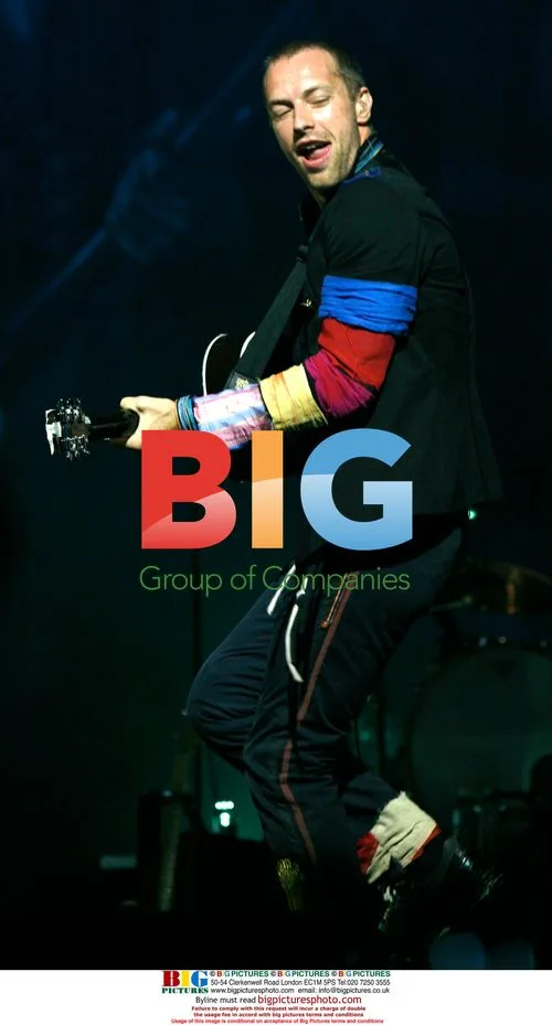 Chris Martin of Coldplay performs in Paris