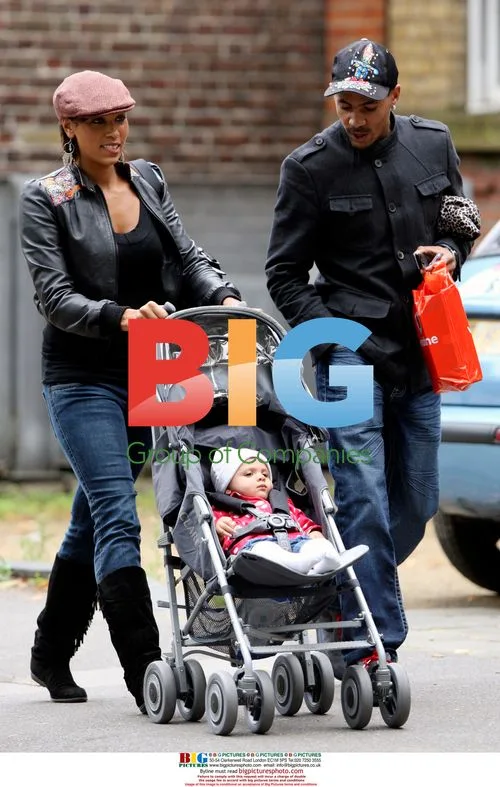 Javine Hylton and MC Harvey with baby in South London