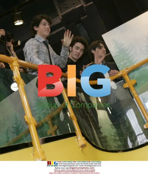 Jonas Brothers greet fans at Disney store in London