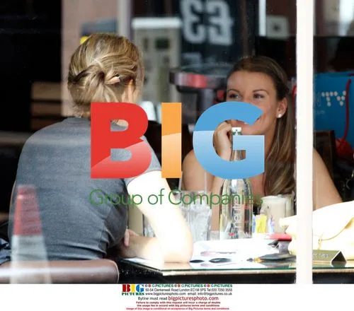 Coleen Rooney has drink with friend in London