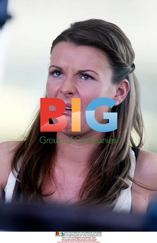 Coleen Rooney drinks with friend in London