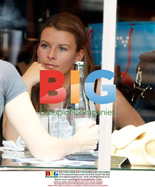 Coleen Rooney has a drink in London