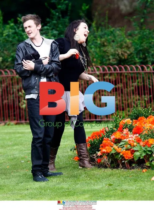 Big Brother's Rebecca and Luke with Puppy