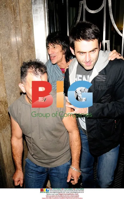 Ronnie Wood and Ronnie O'Sullivan Leave Claridges
